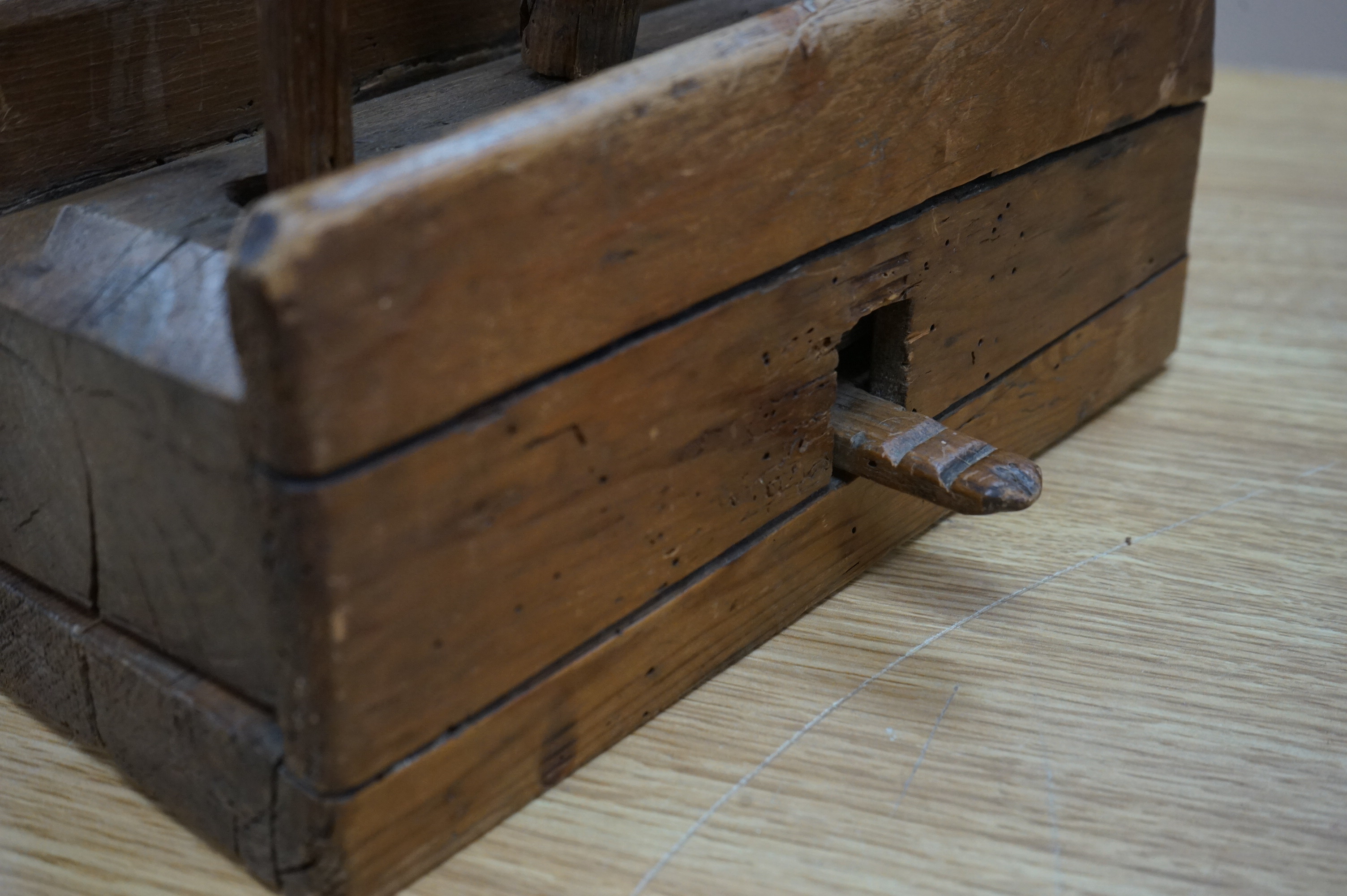 A 19th century provincial wood mouse trap, 25.5cm wide x 28cm high. Condition - some woodworm holes